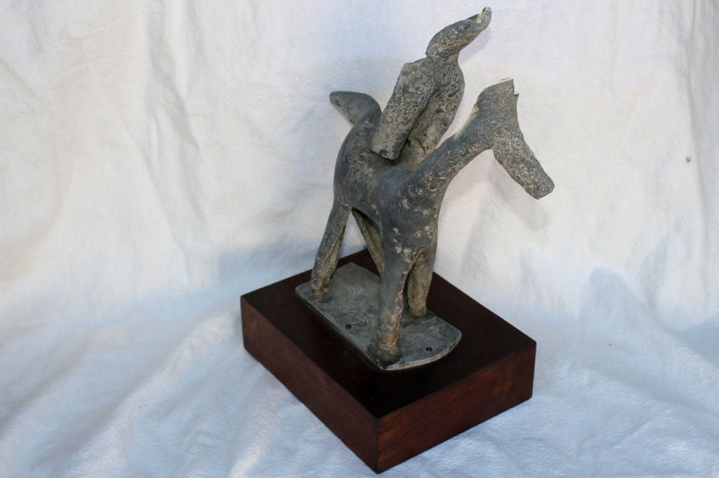 A very nice signed Herbert Kallem Bronze mounted on wood of a horse on a rider. I would date it to the 1960's stylistically. The artist lived from 1904-1994. It is an nice example of the artist's work and is signed in two places on the base