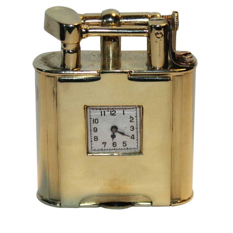 Rare Art Deco Dunhill 14k gold  swing arm lighter watch front