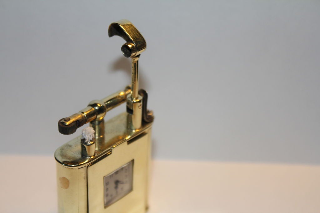 Mid-20th Century Rare Art Deco Dunhill 14k gold  swing arm lighter watch front