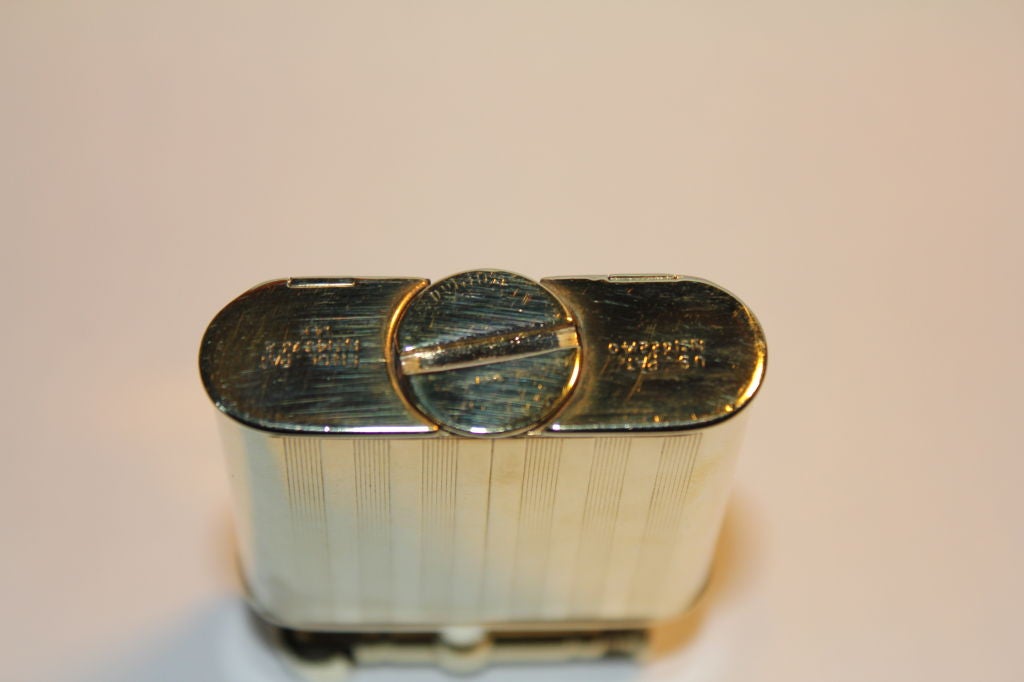 Rare Art Deco Dunhill 14k gold  swing arm lighter watch front 1