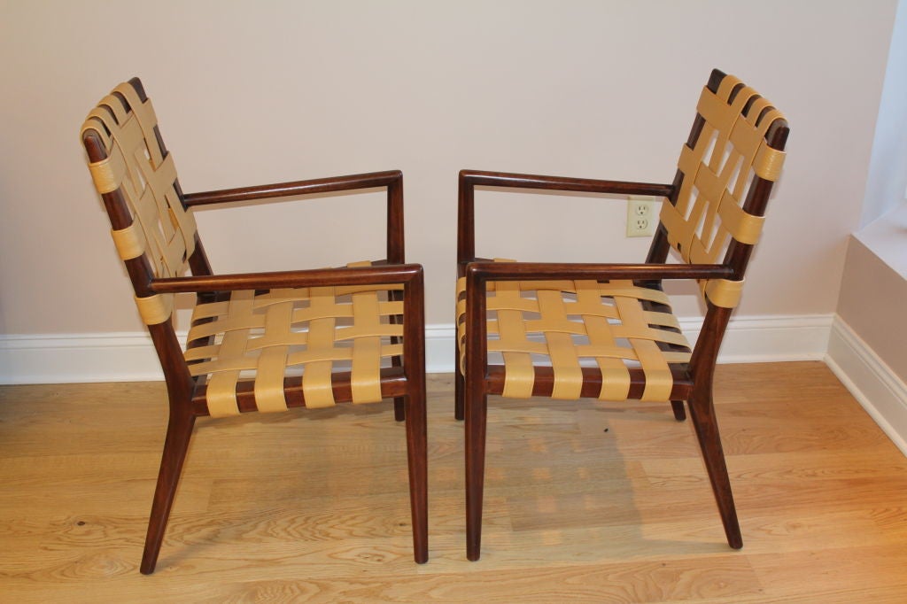 We found these chiars and decided to do them the way we re-did some gibbings chairs a while back, with top stitched leather straps and tacks. The chairs are extremely comfortable. Our restorer had to  fill the top part with some veneer but it looks