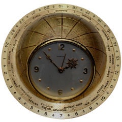 Vintage Elegant Guardier World Time clock with alarm.
