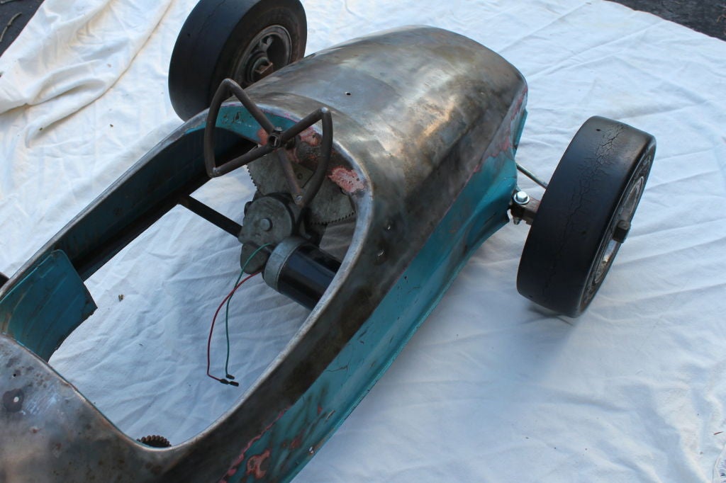 Great 60's hand built steel 3.5 ft electric racing car sculpture