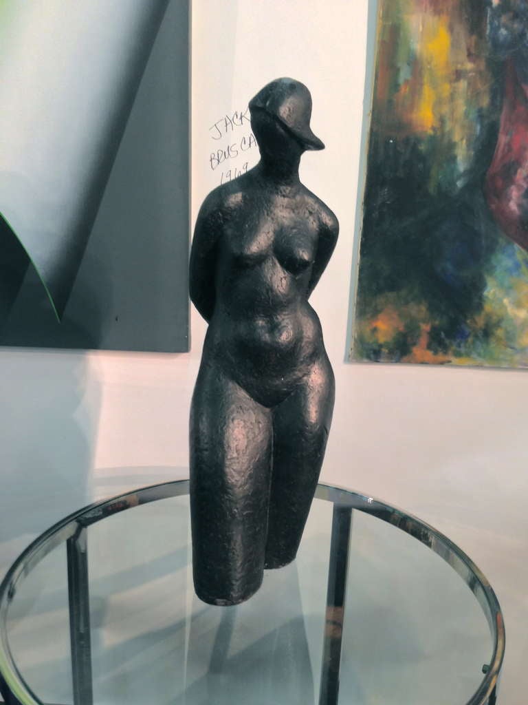 An extremely well rendered plaster torso of a nude woman. The plaster has been painted black. Great form.