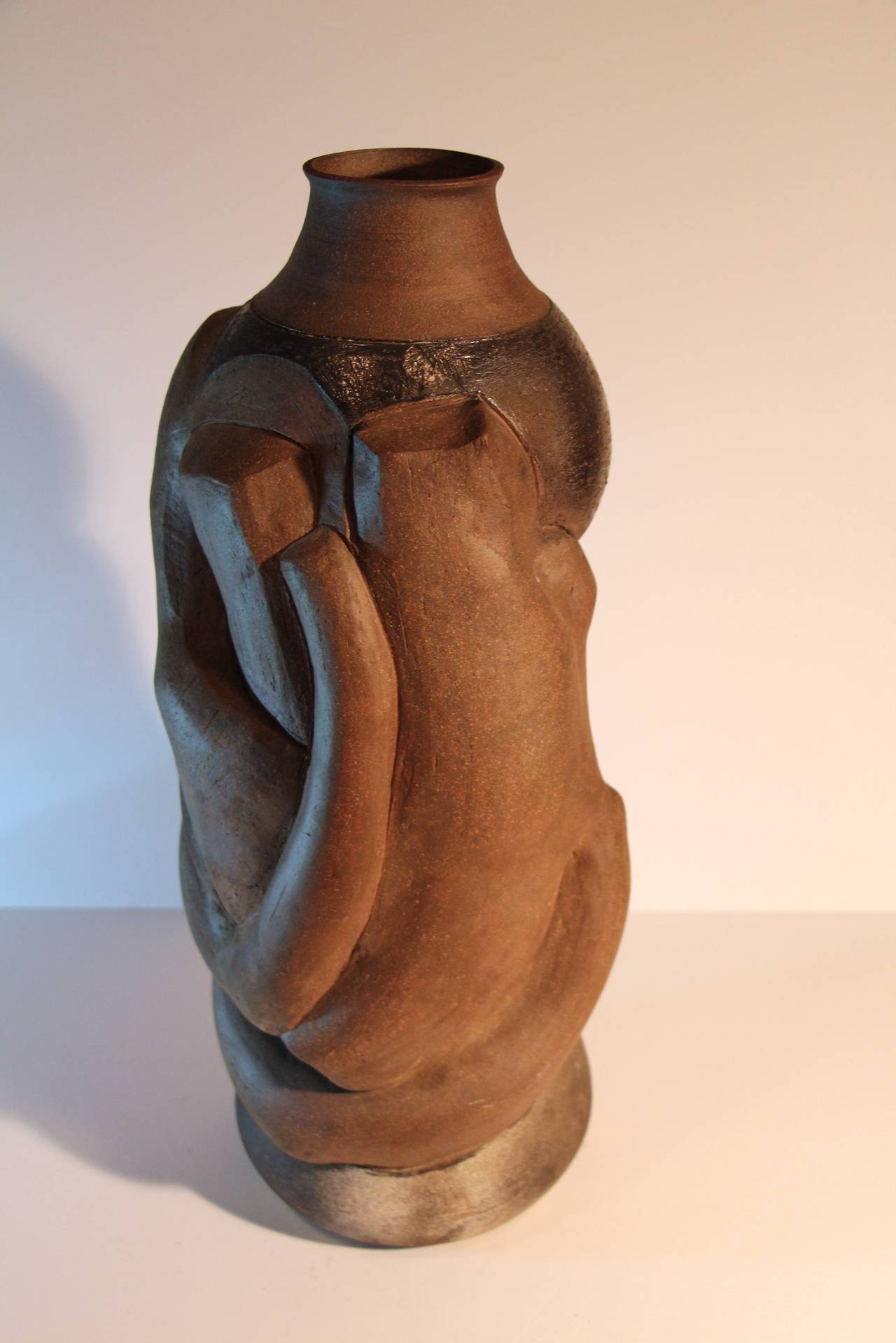 An impressive and large intricate stoneware sculpture. Great form and great size. It will make a statement in any room.
