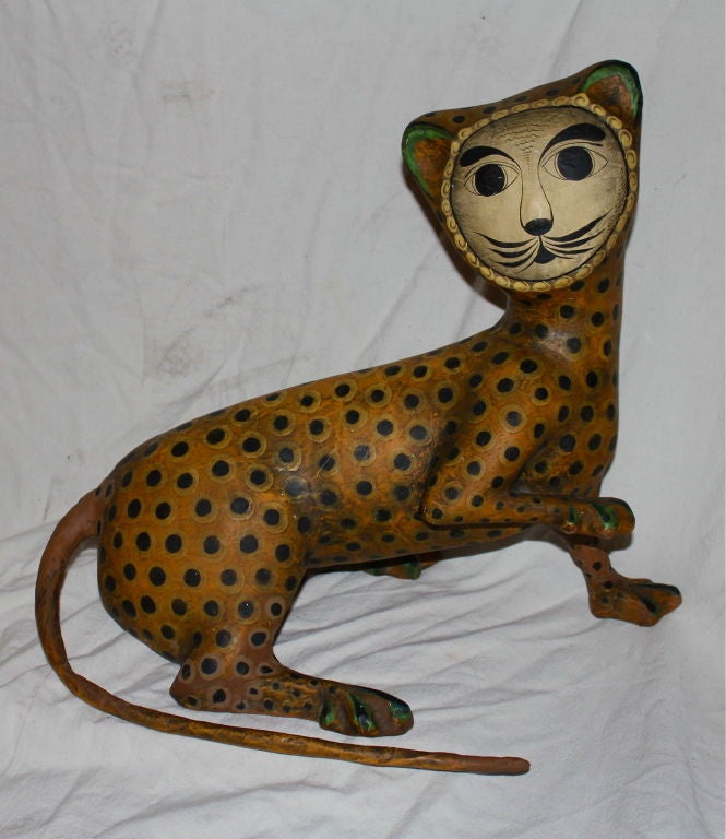 A great looking cat in paper mache signed Sermel Tonala Jal (Jalisco) Mexico. This frim was co-founded by Sergio Bustamante in 1963 I believe. This piece looks to date to the earlier years in from and wear. Great form and whimsical design.