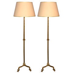 Pair of 1960's gilded iron torchieres or floor lamps