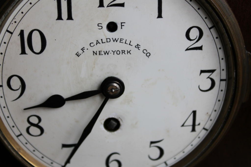 American 19th century Chelsea clock for E.F. Caldwell N.Y. w/ Paw feet