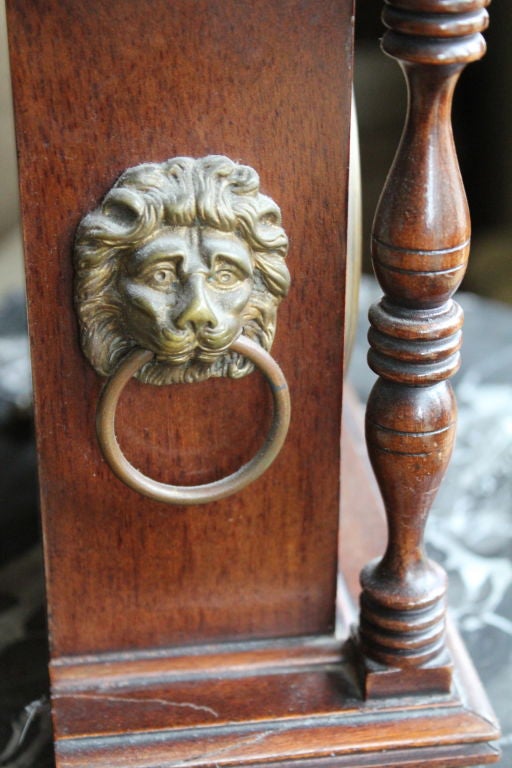 Wood 19th century Chelsea clock for E.F. Caldwell N.Y. w/ Paw feet