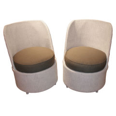 Unusual pair of Lloyd Loom wicker chairs