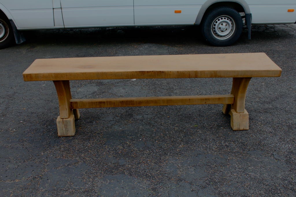 Primitive oak bench made out of huge oak slab