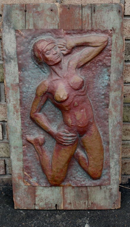Copper hand hammered plaque mounted on barnwood.