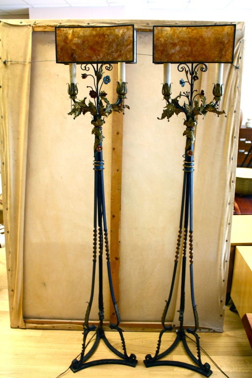 Pr of arts and crafts painted iron torchieres with mica shades