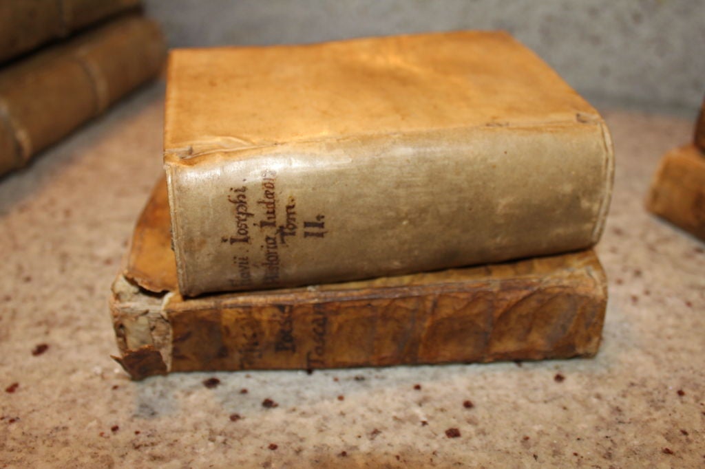 4 17th century vellum covered books