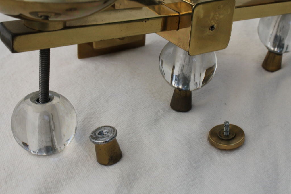 Elegant pair of glass and brass wall sconces at 1stdibs