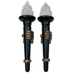 Bronze hand and wood sconces