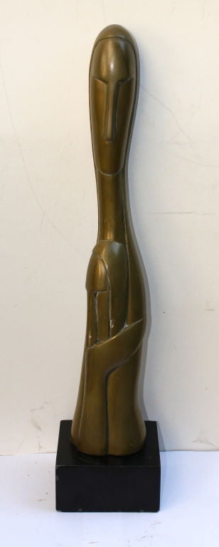 Bronze/brass clad plaster of a mother and child