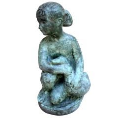Whimsical Spanish pottery figure of a girl with duck