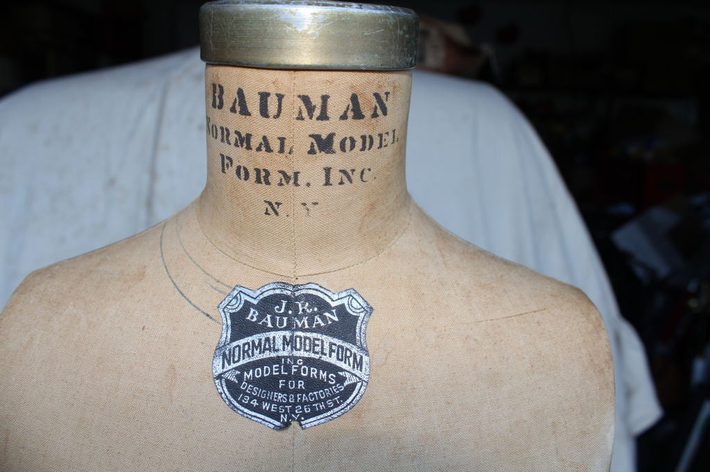 A nice early model 1967 J.R. Bauman dress form or mannequin on a nice marked heavy iron stand.