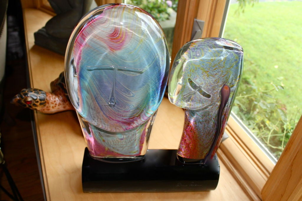 A wonderful and colorful glass sculpture but the noted Italian Glass master Dino Rosin. This large piece depicts the bust of a couple. Signed in front and originally had an exhibition tag that has worn off, so we removed the remnants. Colorful a