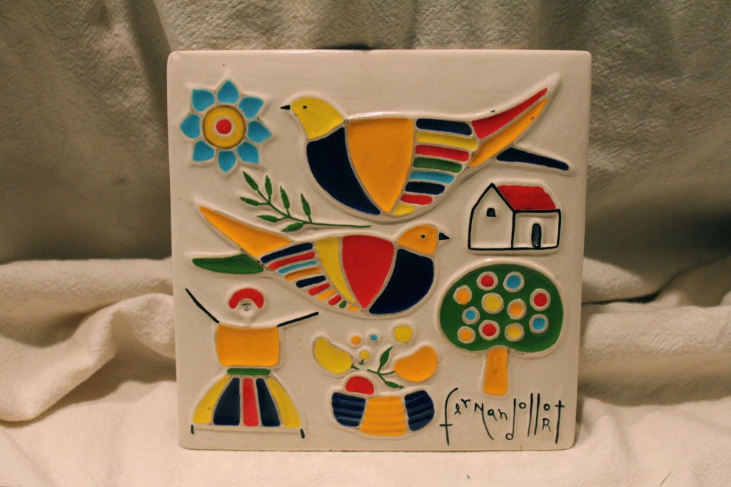 A very nice ceramic tile or plaque by the noted Salvadoran artist Fernando Llort. It is signed lower right. Colorful and vibrant.<br />
A brief blurb from Wikipedia follows;<br />
Fernando Llort Choussy (born April 7, 1949 in San Salvador, El
