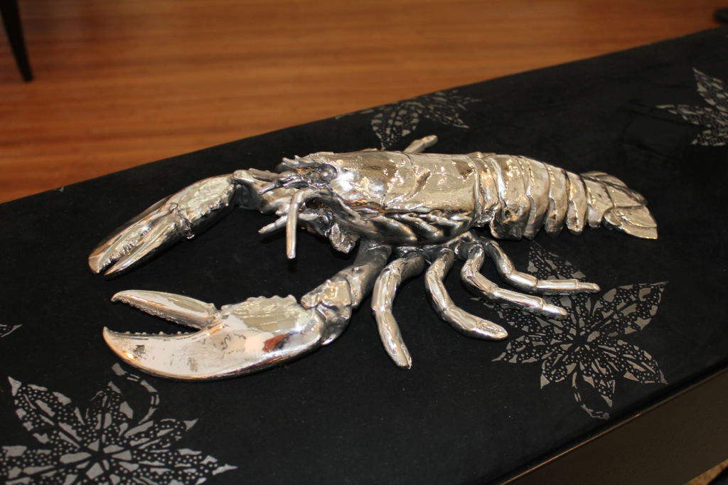 A heavy electroplated lobster, probably first plated in copper and then in silver-plate or possible nickel. The detail on this piece is incredible.