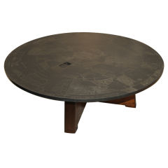 Important hierogamy etched slate top table with mahogany base