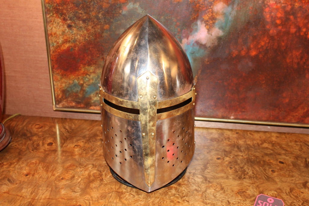 An extremely well made movie prop out of a defunct movie prop display house. It is made of steel and brass with copper rivets.