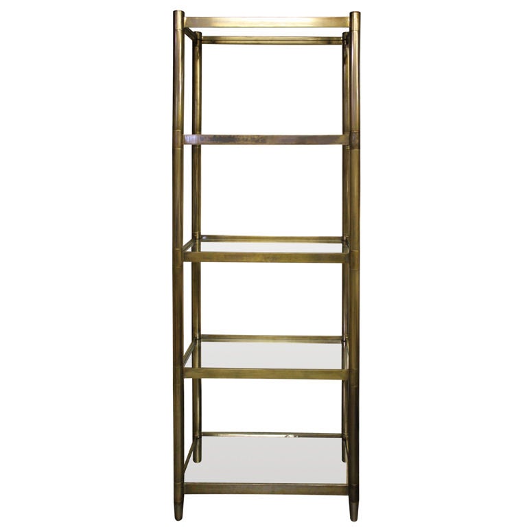 Heavy Brass plated iron etagere with glass shelves at 1stDibs brass