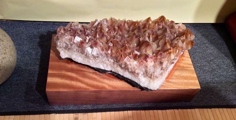 A rare piece of Mariposa butterfly calcite that weights over 50 pounds. It has been mounted on a sturdy decorative display box. This specimen comes forms only one specific mine which is now underwater. 
This highly aesthetic specimen of Mariposa