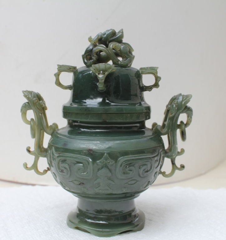 A beautifully carved green jade censor with carved creatures as handles and a Kylin figure on top. Nice color and exquisite carving.