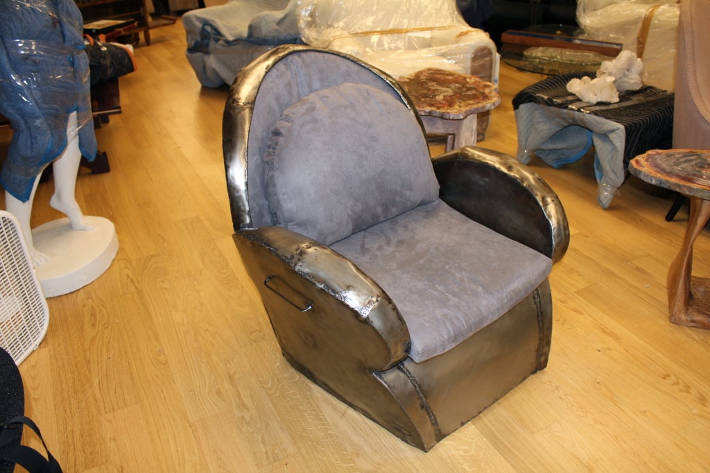 An unusual handmade and welded steel chair in new upholstery. This chair was thought to have been sold at auction as part of the Mama Cass estate.