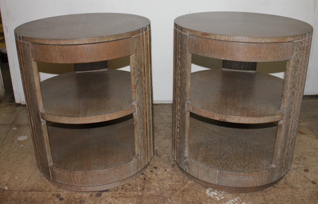 Pair of Grosfeld house rotating tables with drawers.