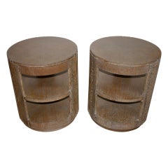 Pair of Grosfeld house rotating tables with drawers.