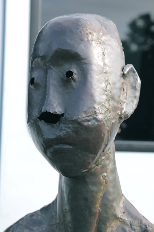 A wonderful copper welded sculpture of a boy by the noted artist Louis Ludvick ludvik Durchanek (1902-1977). The sculpture id monogrammed on the base of one leg with his typical LD. The artist was born in Austria in 1902 and emigrated to the United