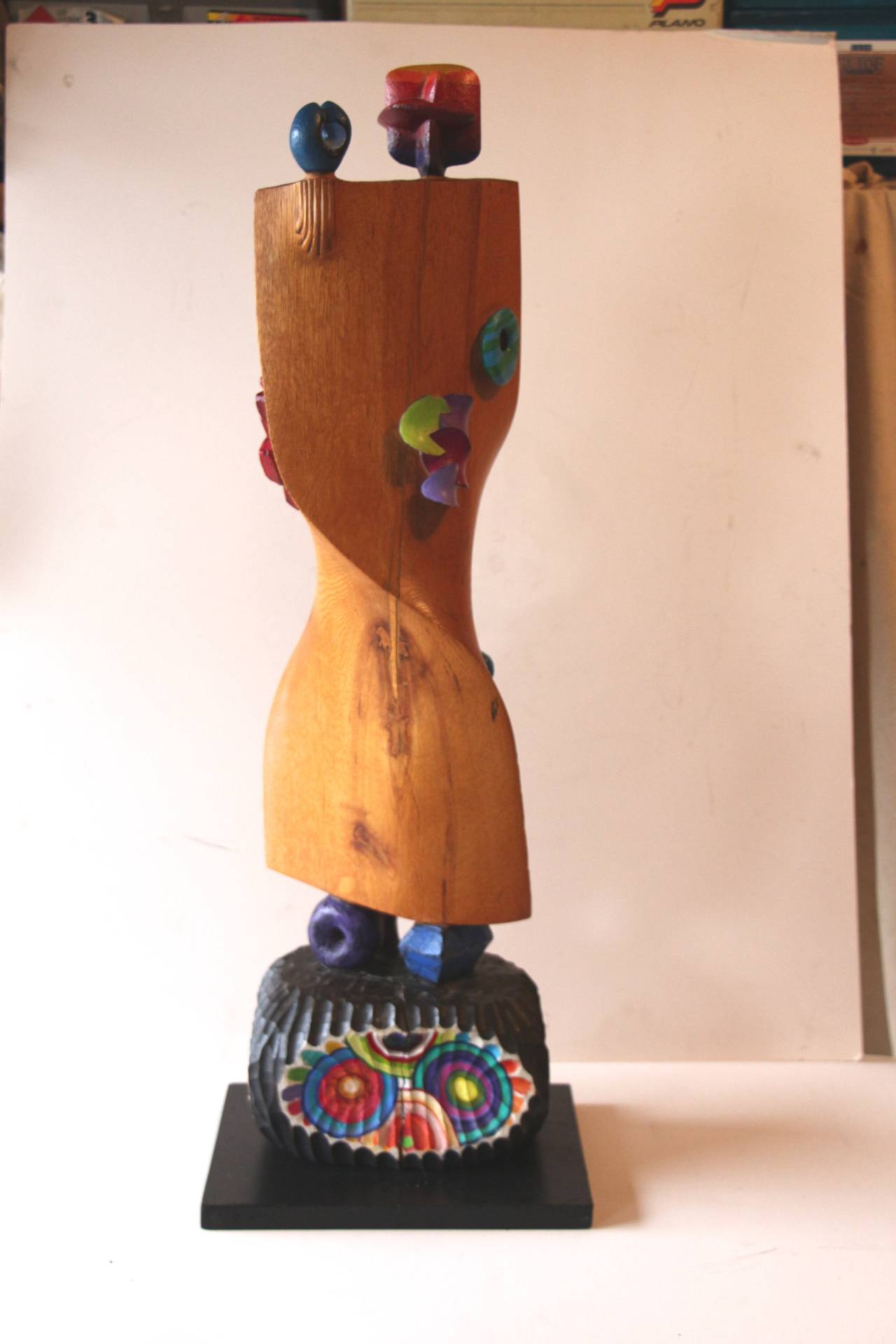 A wonderful wood sculpture by the noted NJ artist Fred Scumm. It is inscribed near the base with no date. Likely from the late 1980s or early 1990s. Colorful and whimsical. The artist statement follows from a 2007 article;
Fred Schumm does not view