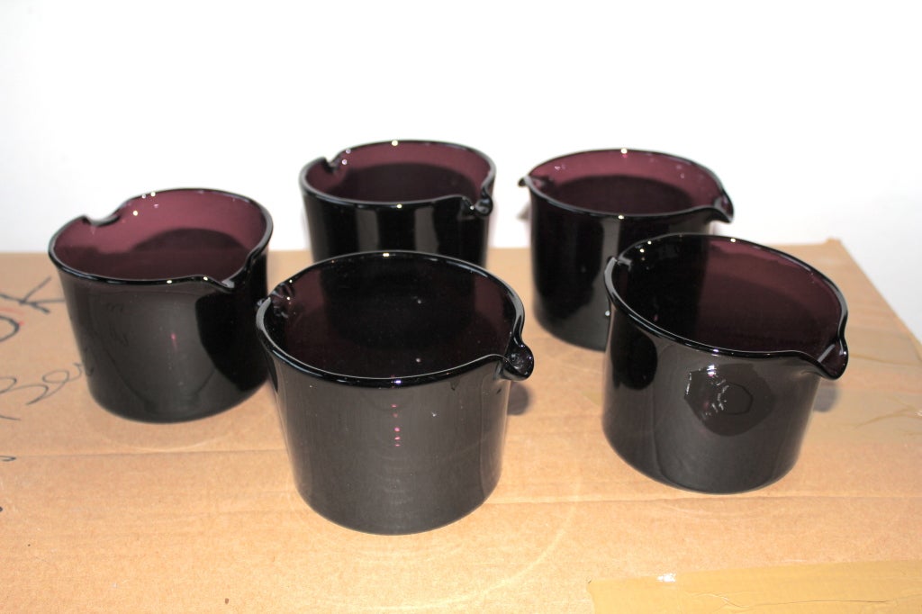 A beautiful set of 5 amethyst glass hand blown wine rinsers. These were used to rinse your wine glass before a new bottle was poured.