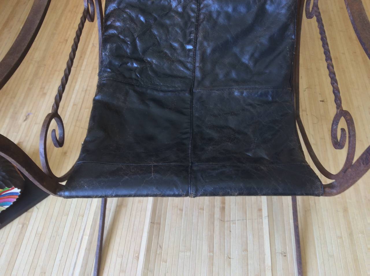 Sleek Iron and Leather Sling Chair 4
