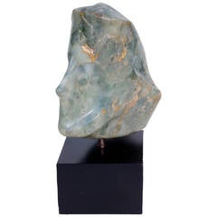 Carved abstract stone bust