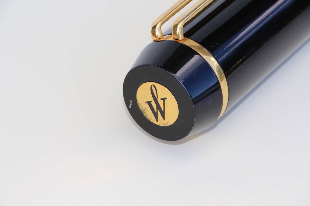 A large waterman ideal fountain pen most likely a store display item. It is large, approximately 27 inches long. The nib is marked waterman ideal 18k-750 Paris France.
Please note the nib is most like not really gold, although I have not tested it.
