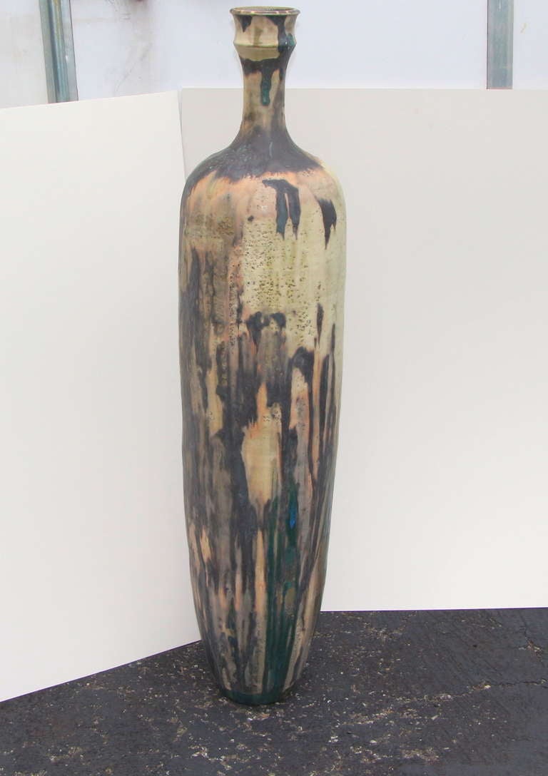 Darren Prodger, American, Contemporary, Tall Narrow Glazed Pottery Vase.
Note: the artist was a student of Toshiko Takaezu.
Provenance: purchased directly from the artist in 1998.