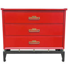 Red Chest In An Asian Motif With Brass Accents