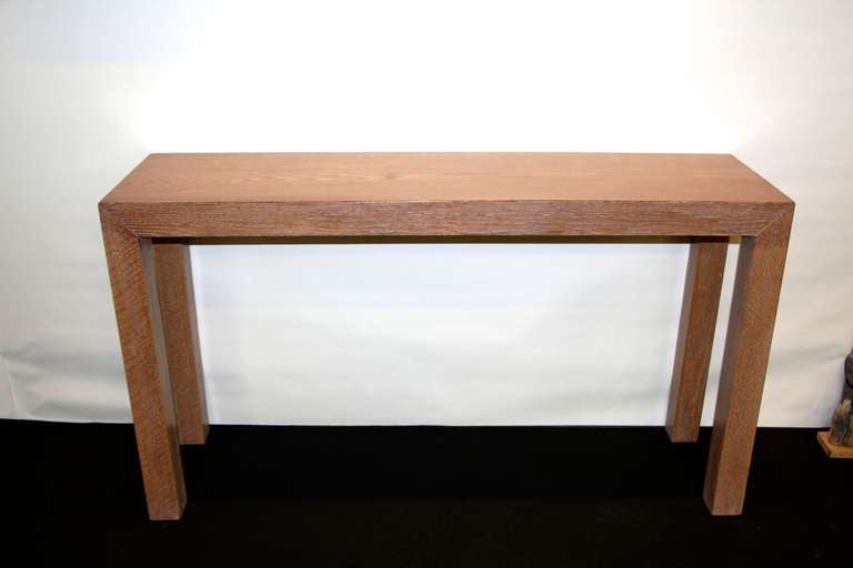 Solid artisan made cerused or lime oak console table. Great graining and nice color. This table is not veneered it is made from solid oak. Age related wear, marks and some imperfections.