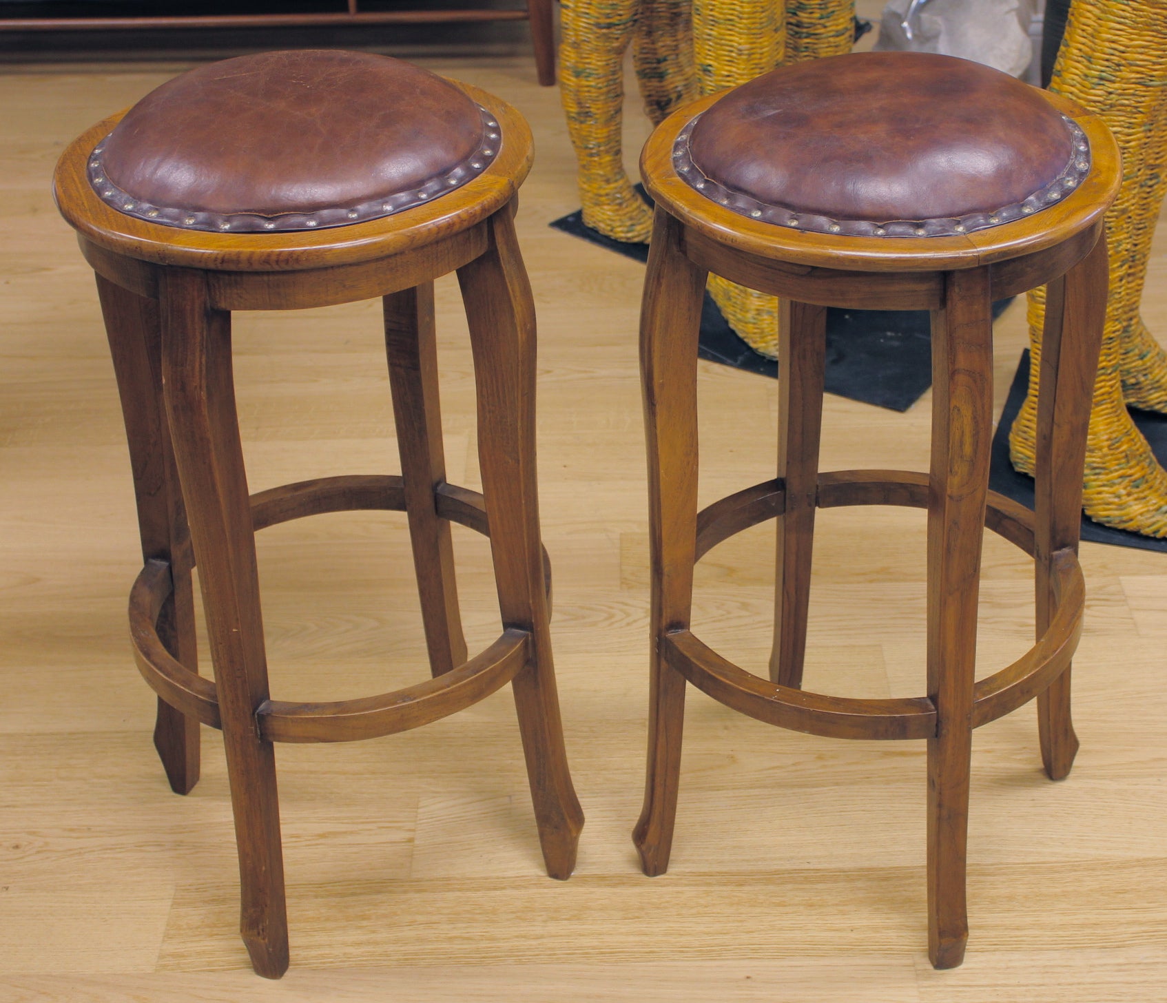 Pair of vintage leather top oak bar stools at 1stDibs