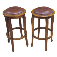 Pair of vintage leather top oak bar stools