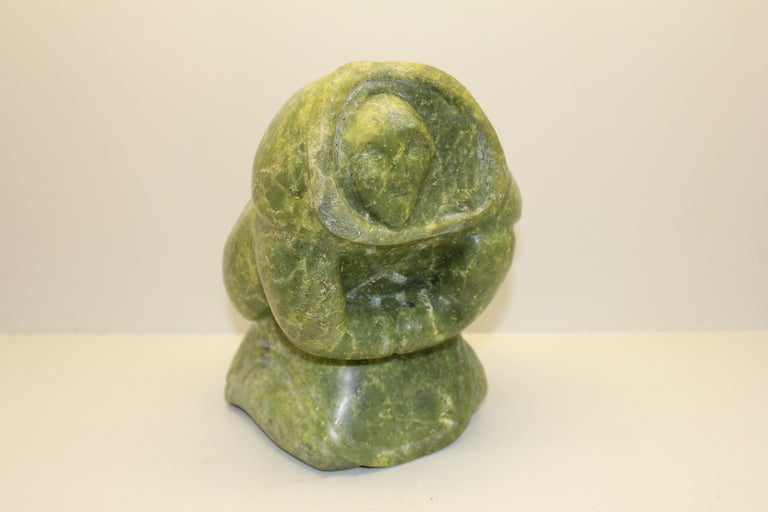 A nice large Inuit or eskimo carving in a great unusual shade of green soapstone. This color is somewhat unusual and the carving is well done. From a great estate collection.