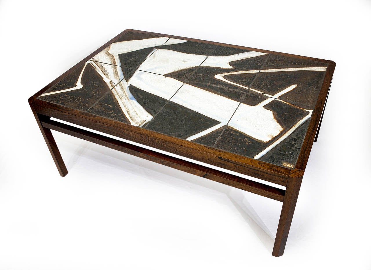 Danish rosewood abstract tile coffee table.  Store formerly known as ARTFUL DODGER INC