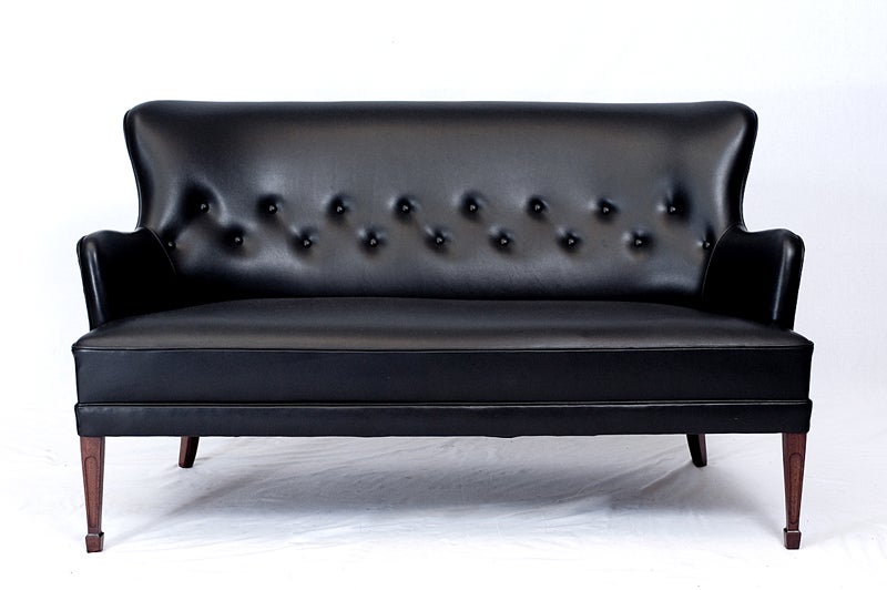 Frits Henningsen Settee.   Store formerly known as ARTFUL DODGER INC