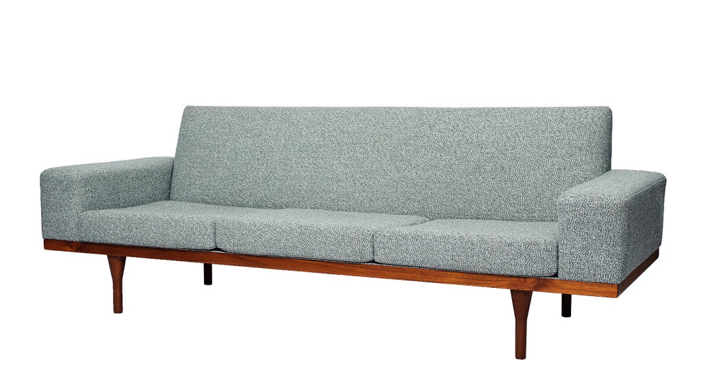 Illum Wikkelso Sofa.   NOTE: The one shown here was recently sold, but I have a 4 seater that needs reupholstering.  It looks the same except that it is 1 cushion longer (104