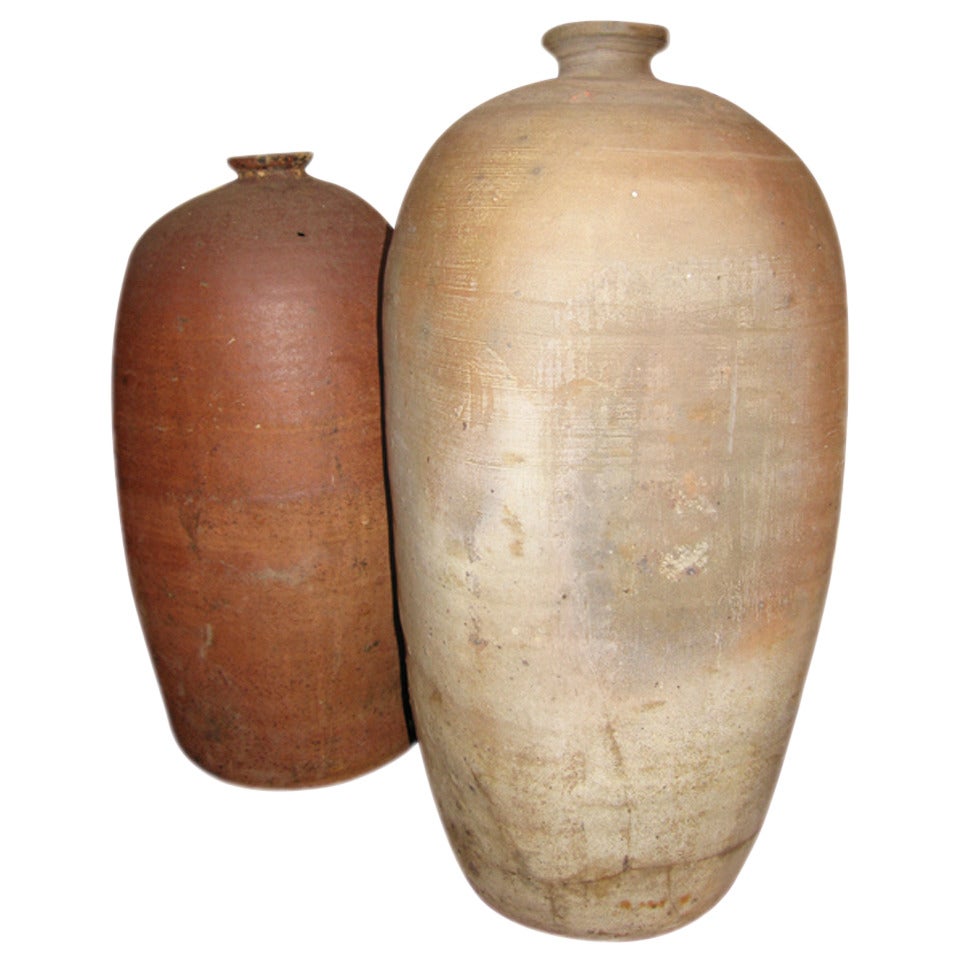 Pair Stoneware Oil Vessels